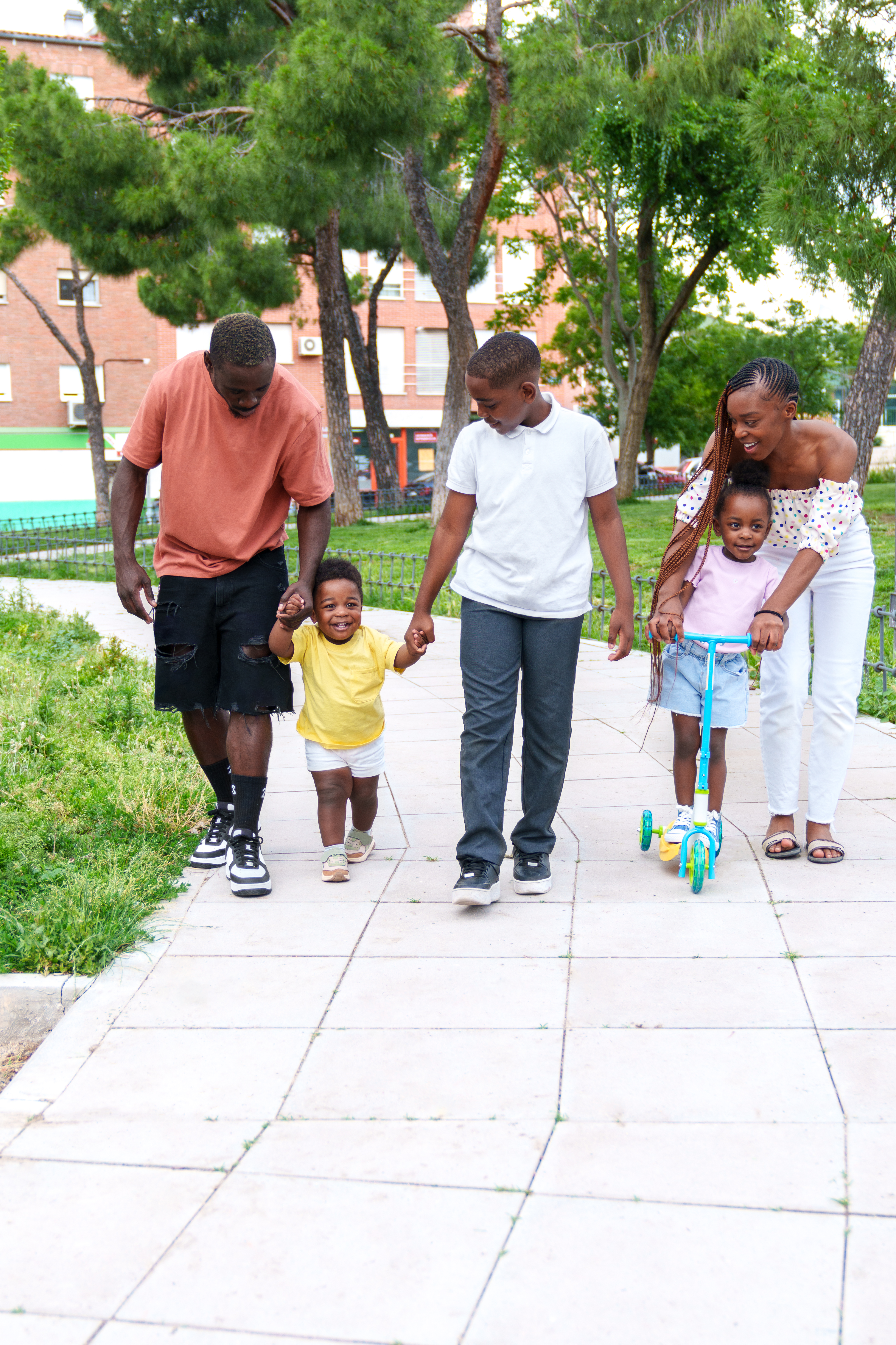 Happy family walking hand in hand