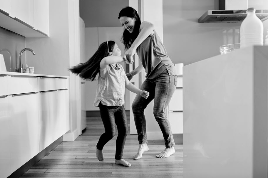 happy mom and daughter Home