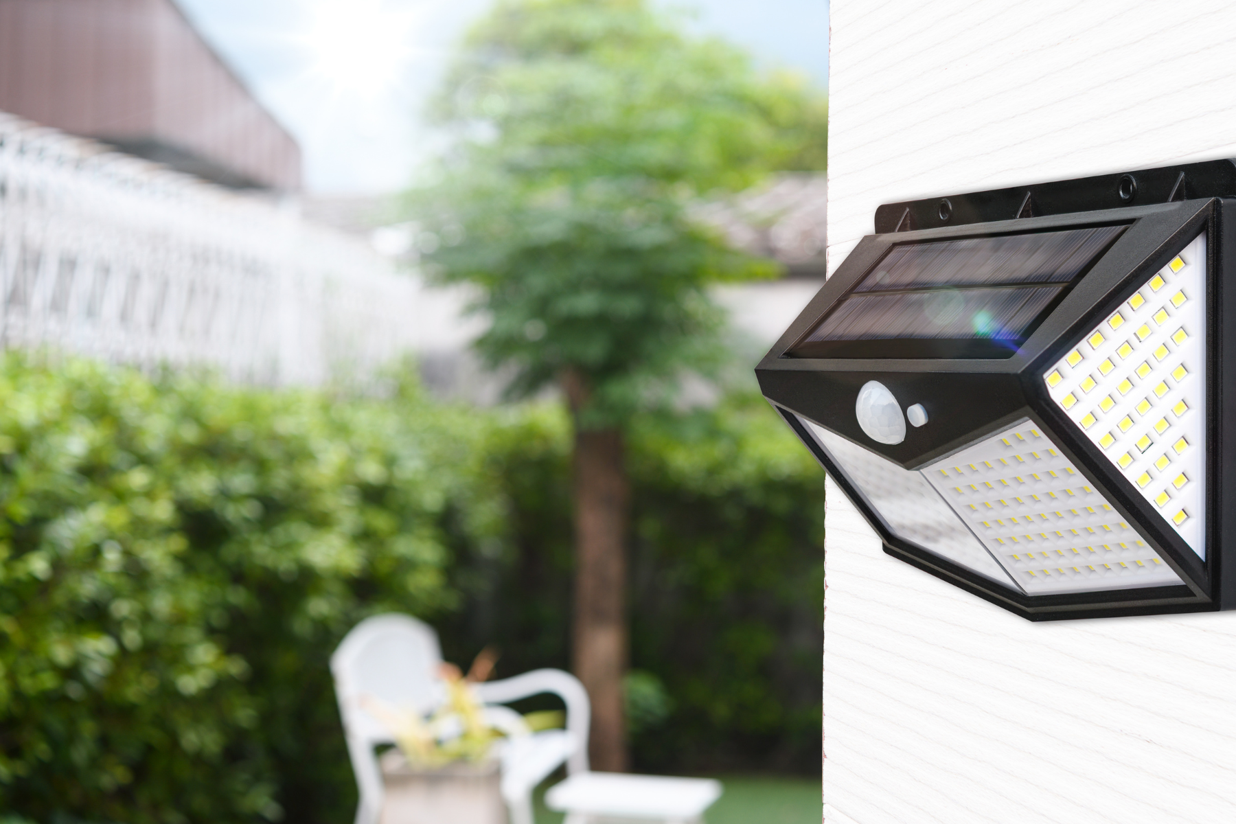 This close-up image showcases a modern solar-powered motion light mounted on an exterior wall, emphasizing the importance of outdoor lighting in both security and curb appeal. This close-up image showcases a modern solar-powered motion light mounted on an exterior wall, emphasizing the importance of outdoor lighting in both security and curb appeal.