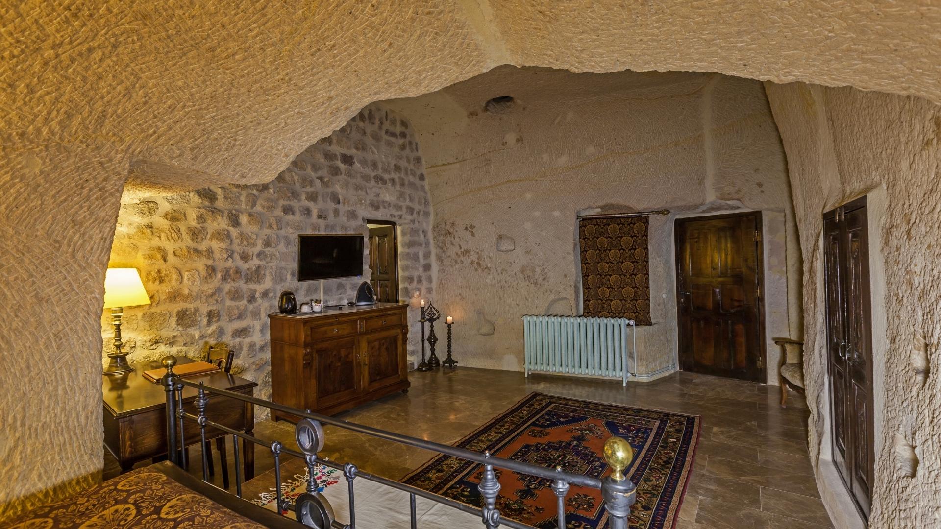Work desk and amenities in classic single room Yunak Evleri cave hotel
