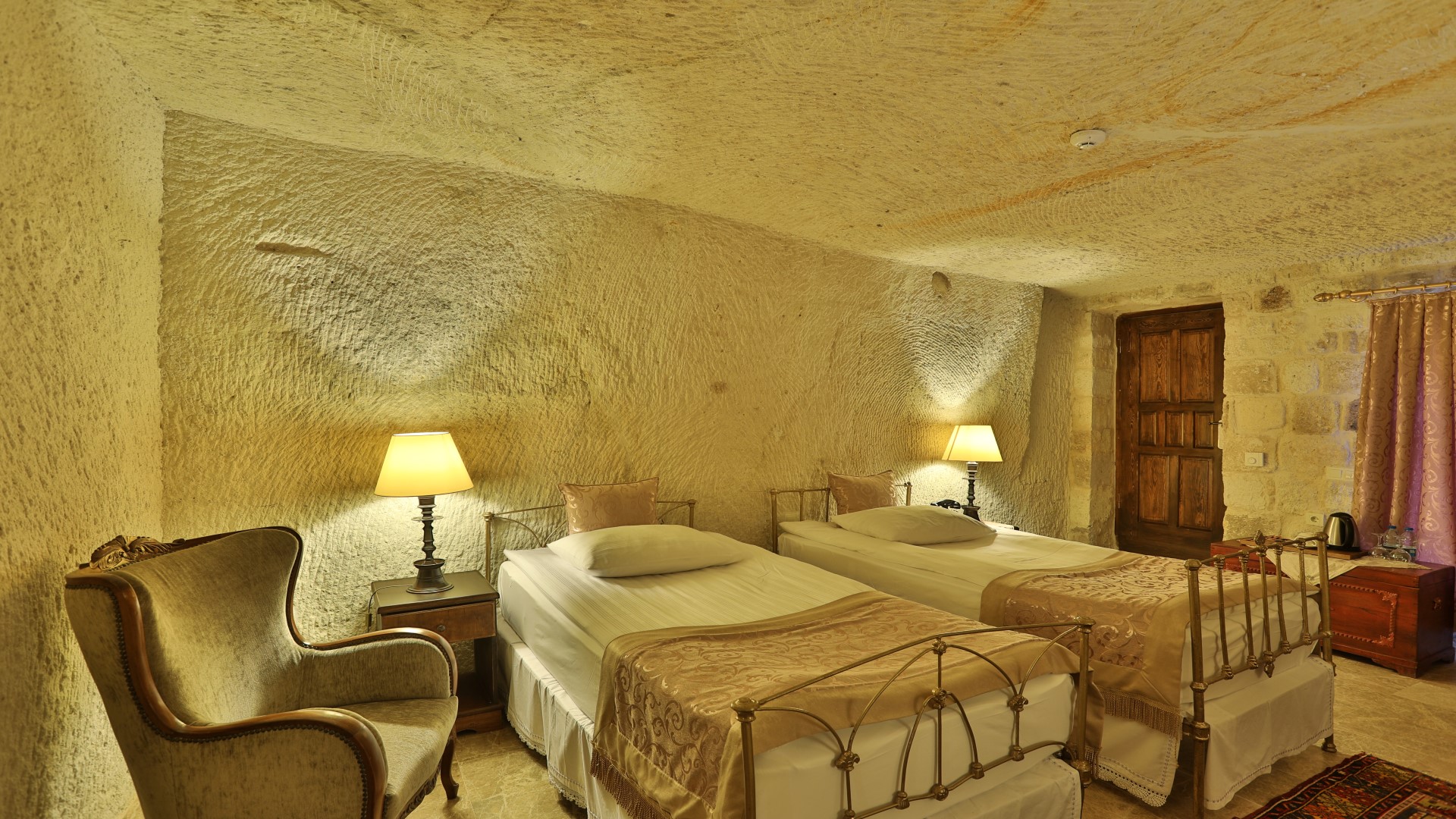 Spacious 35m2 classic double room interior at historic cave hotel Turkey