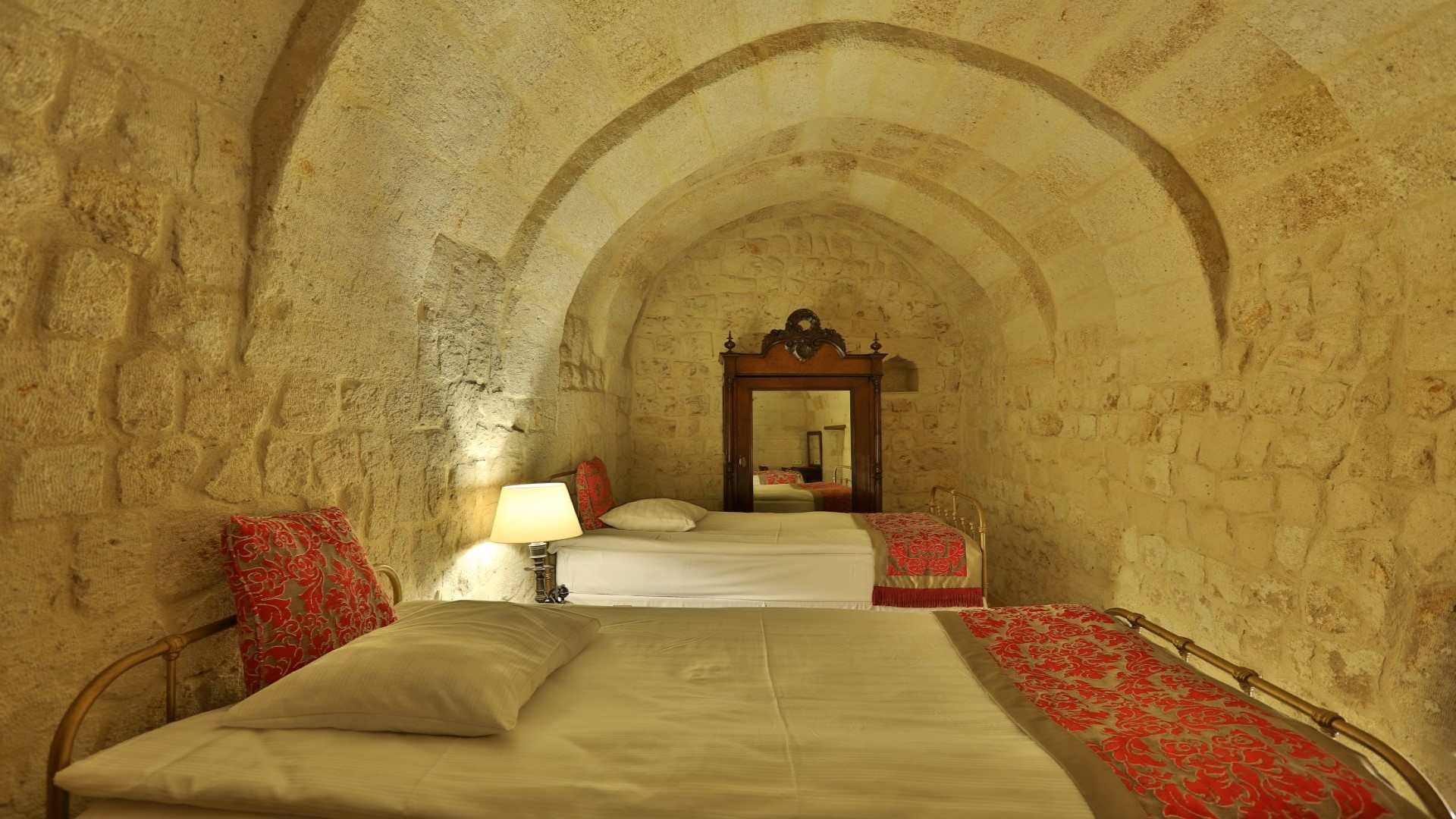 Double bed in spacious deluxe room for 2 people at consciousness festival