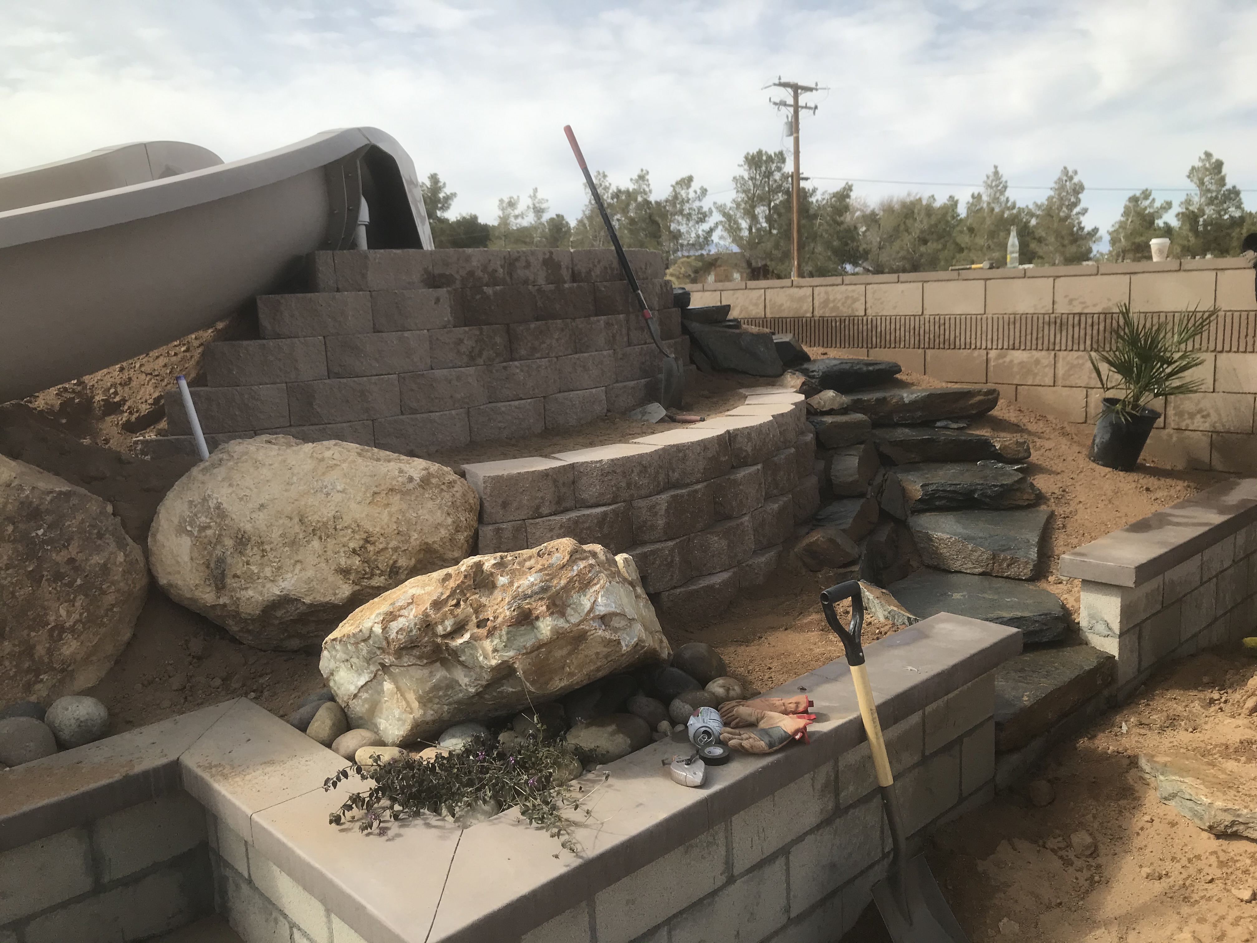 Custom hardscaping and pool deck design in Ridgecrest — pavers and desert-friendly landscaping