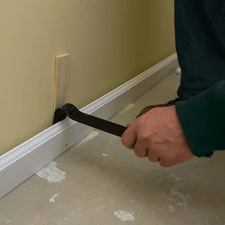 Remove Baseboards and Old Flooring Remove Baseboards and Old Flooring