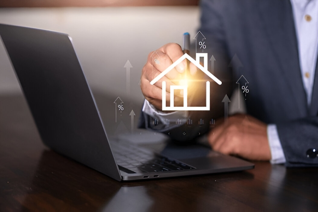 A hand interacts with a laptop displaying a house icon and rising arrows, illustrating AMPLIFIREI's effective pipeline management software.