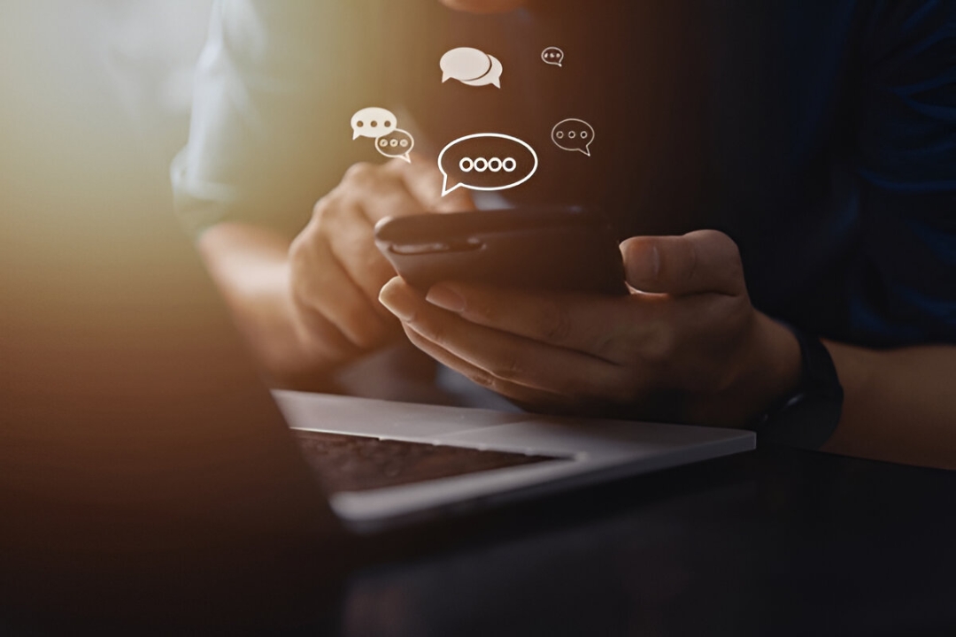 Person using smartphone for automating property follow-up sequences, boosting real estate engagement with AMPLIFIREI software. Person using smartphone for automating property follow-up sequences, boosting real estate engagement with AMPLIFIREI software.