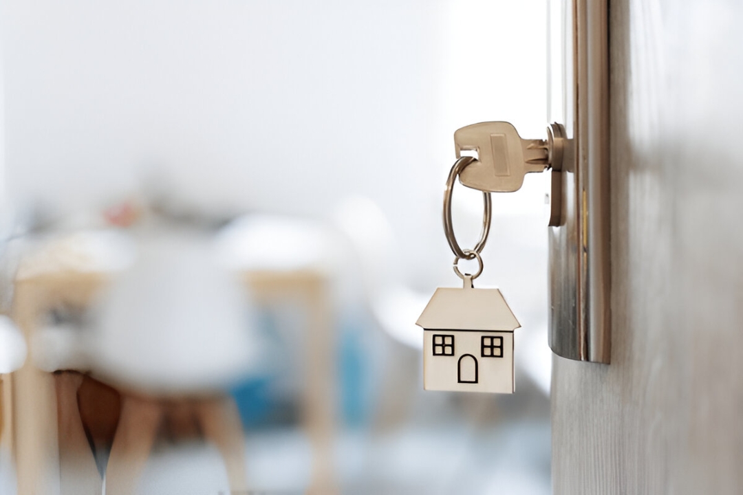 A hand unlocking a door with a house key, a guide for split-testing REI campaign messages from AMPLIFIREI. A hand unlocking a door with a house key, a guide for split-testing REI campaign messages from AMPLIFIREI.