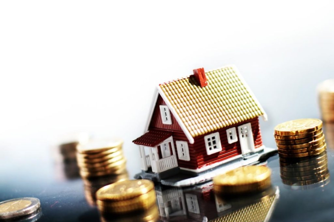 A model house sits among coins, symbolizing split-testing REI campaign messages for financial success by AMPLIFIREI. A model house sits among coins, symbolizing split-testing REI campaign messages for financial success by AMPLIFIREI.