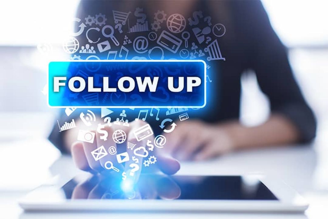 A woman holds a tablet with a "FOLLOW UP" button, showcasing marketing automation best practices by AMPLIFIREI. A woman holds a tablet with a "FOLLOW UP" button, showcasing marketing automation best practices by AMPLIFIREI.