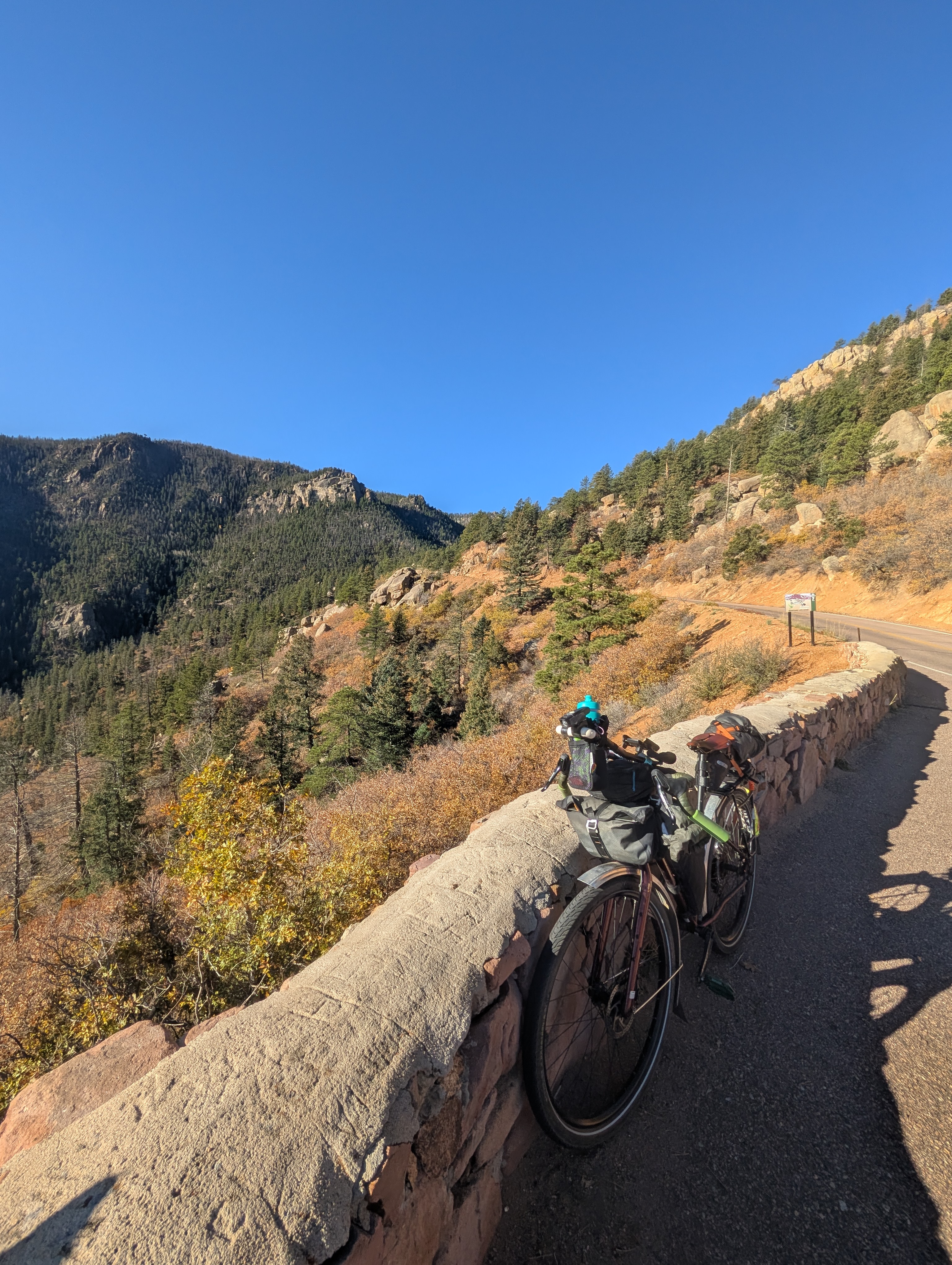 Colorado Springs Biking and Homes Guide A mountain biker on a trail in Colorado Springs, representing the local guide to biking and real estate.