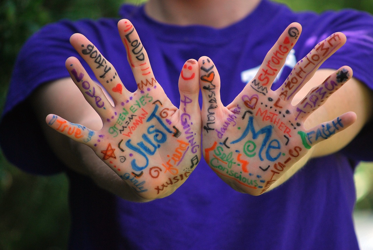 woman hands with words written on them