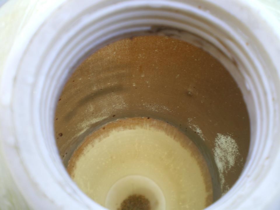 mineral tank we emptied out after removing it, because of discolored water as reported by the home owner