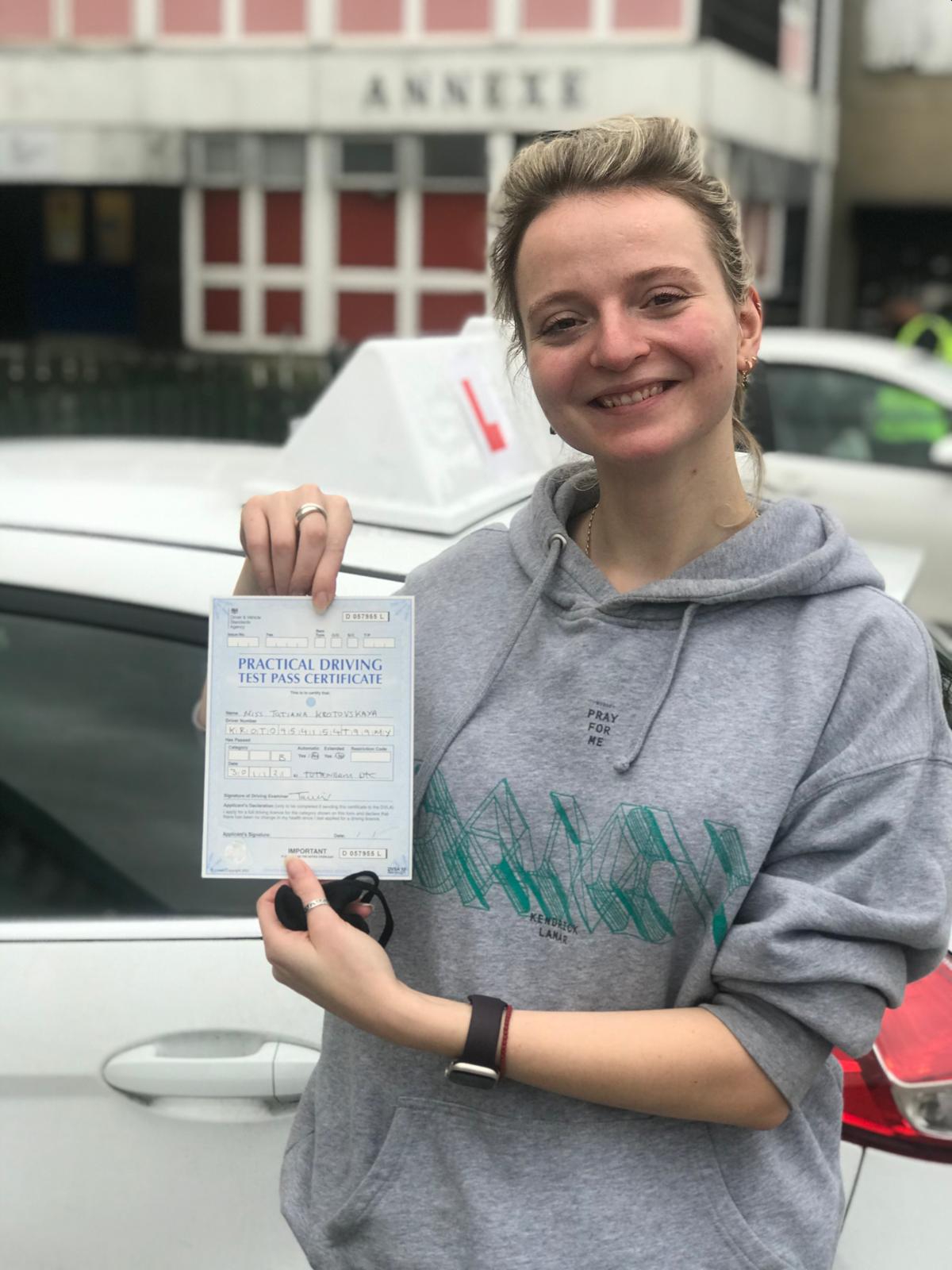 Successful student with pass certificate