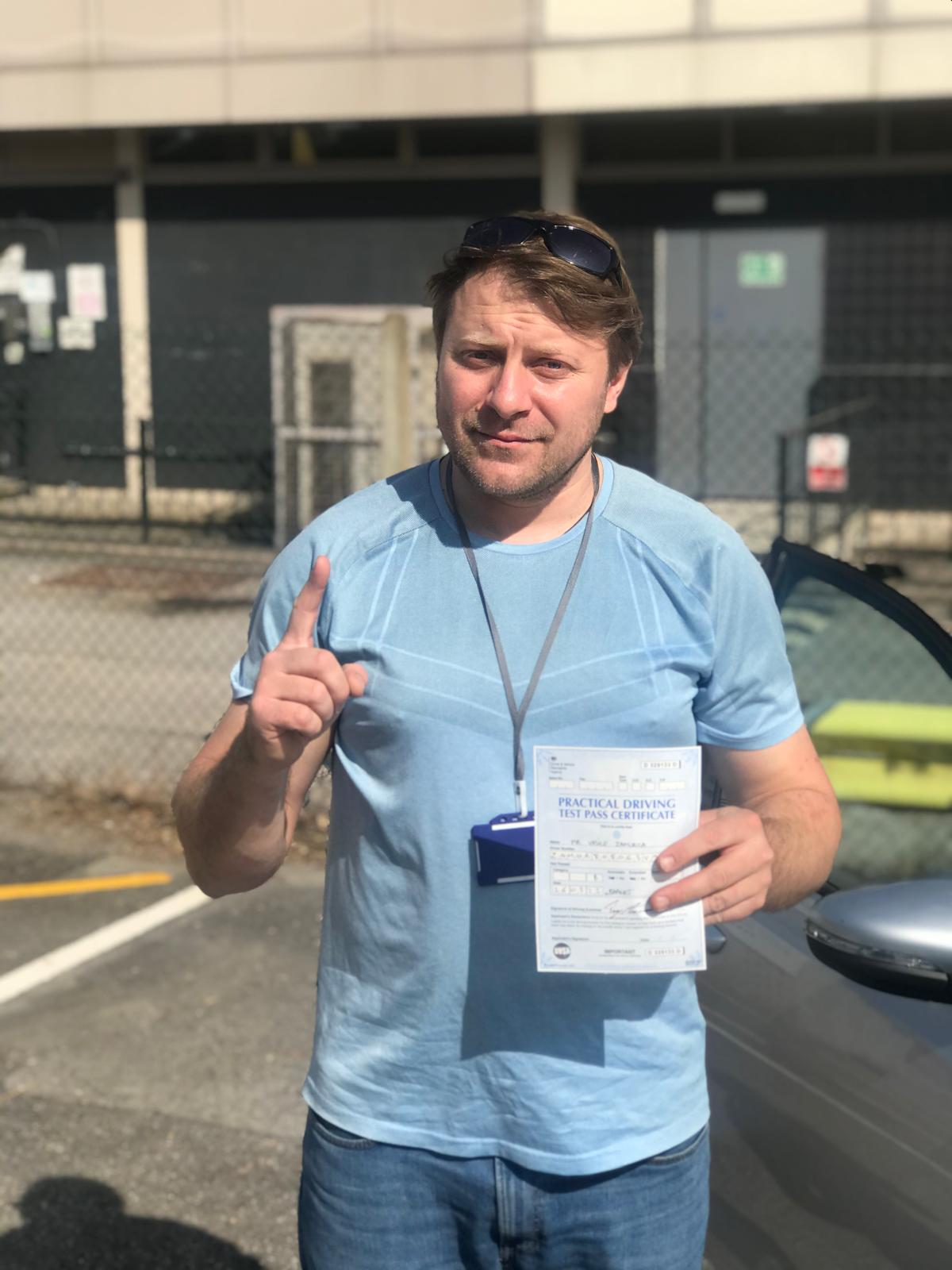 Successful student with pass certificate