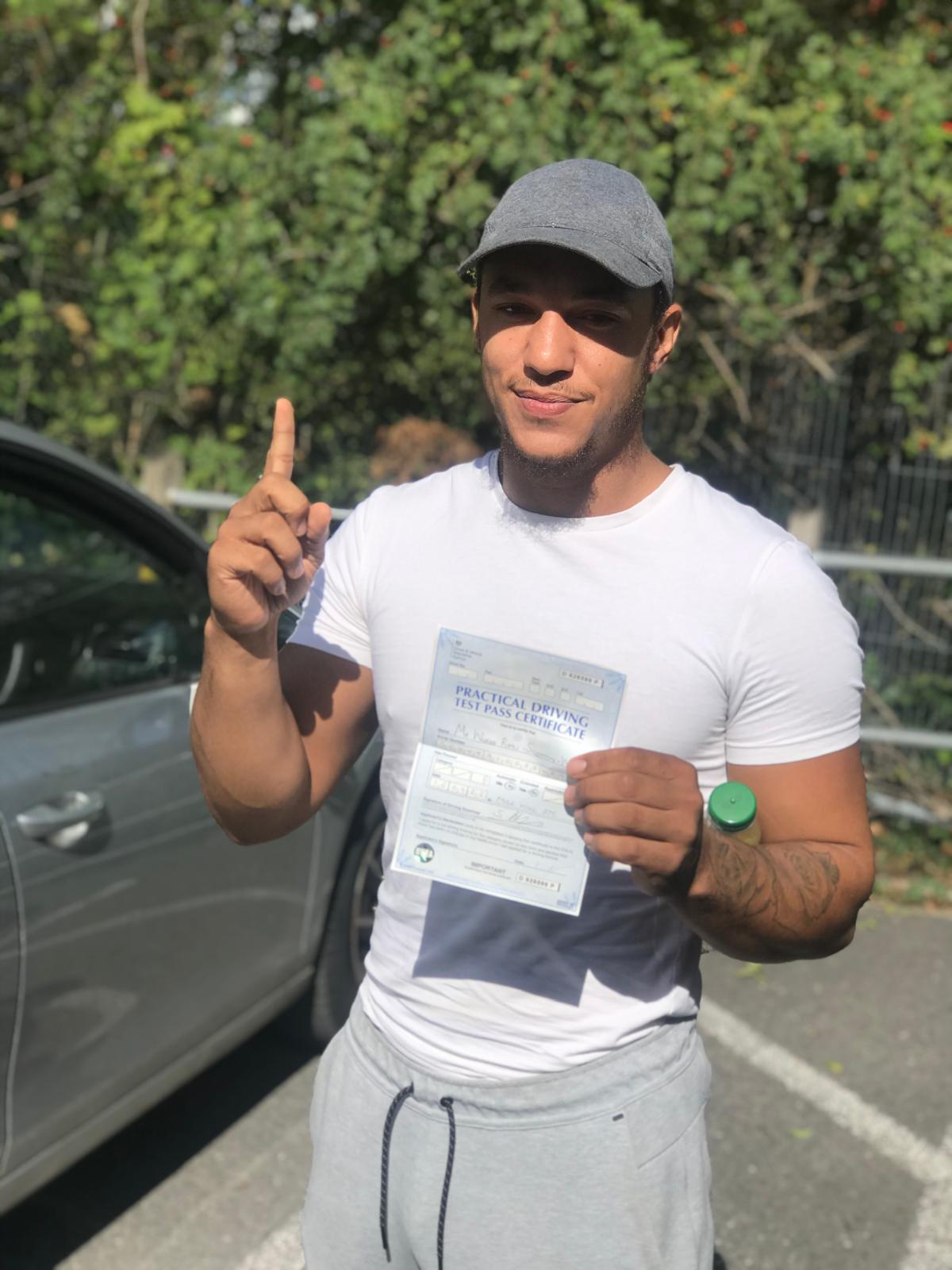 Successful student with pass certificate