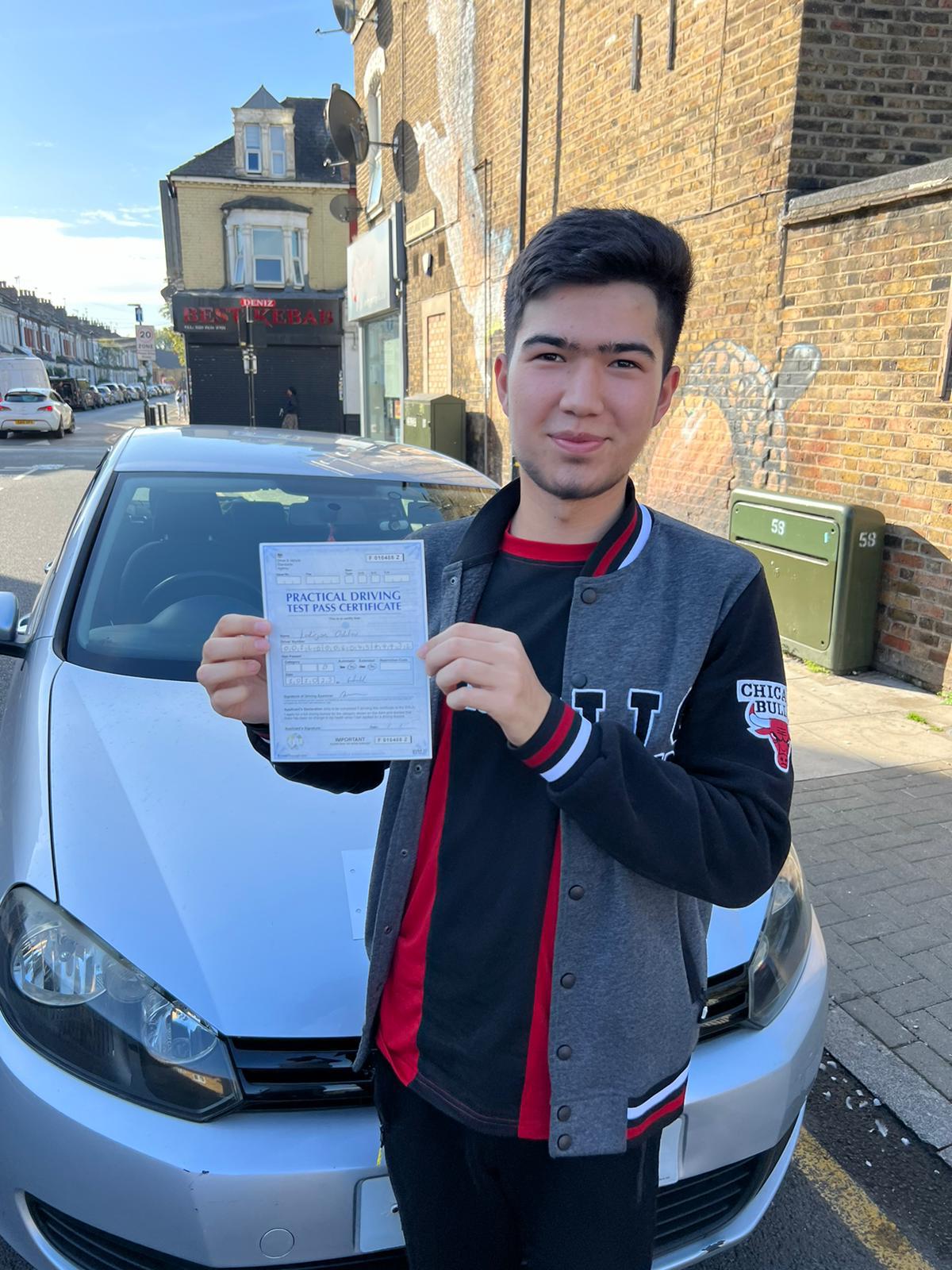 Successful student with pass certificate