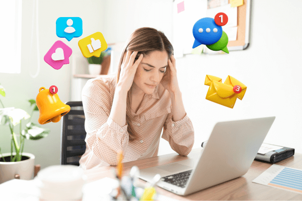 Overwhelmed entrepreneur surrounded by digital notifications