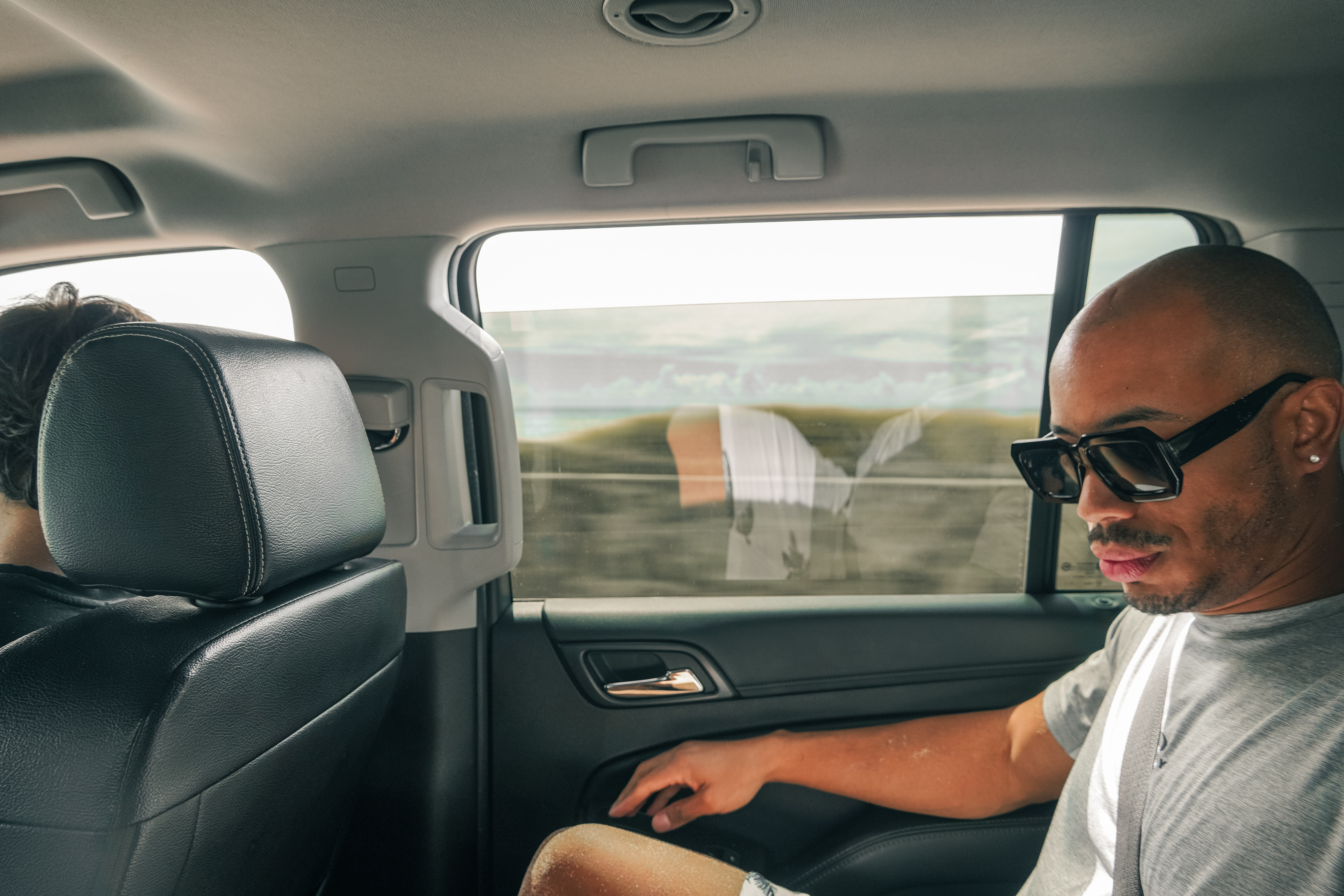 Quentin B Smith being driven to surf in Honolulu, Hawaii