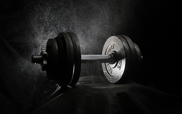 barbells on a rubber gym floor