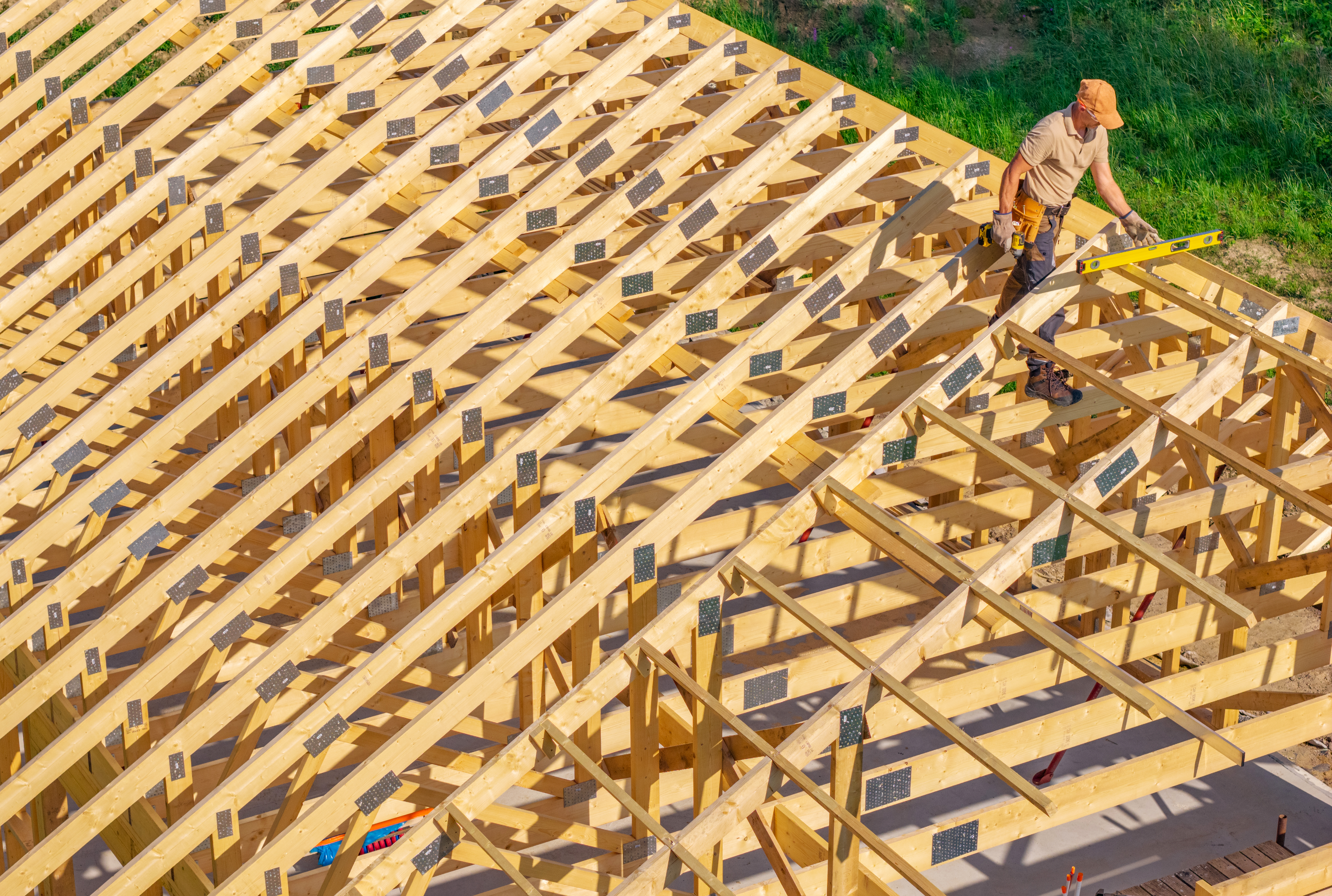 Chimney flashing and roof ventilation components on a Houston home