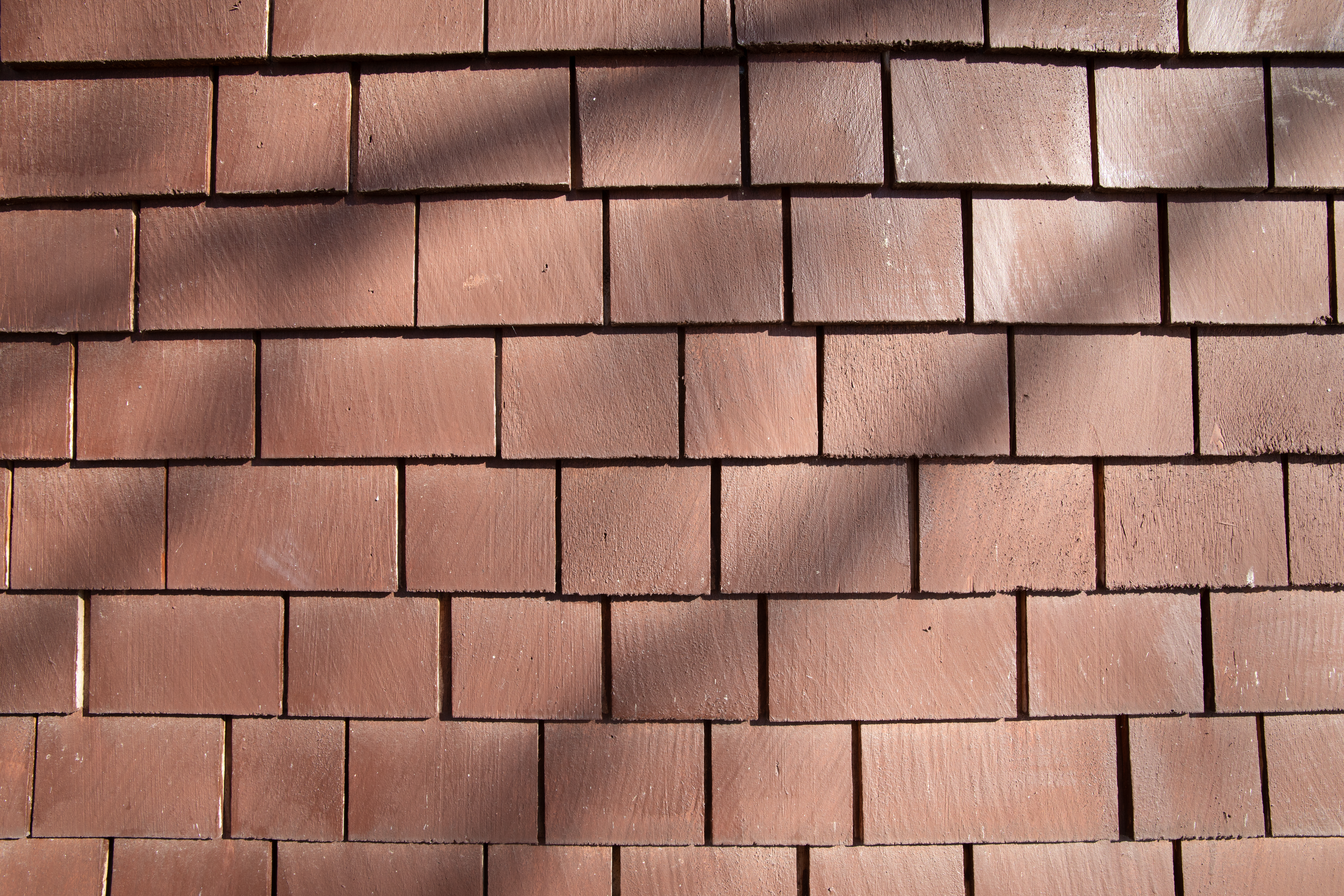 Clean finished roof with algae-resistant architectural shingles