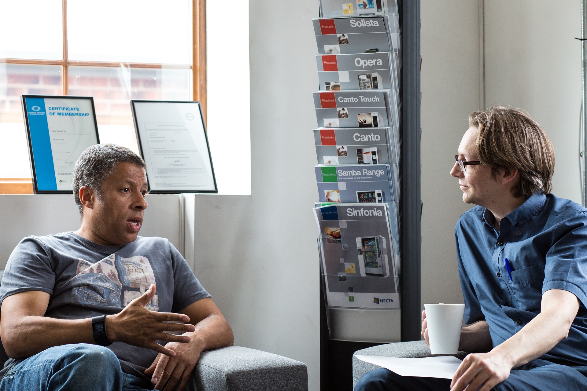 Two men having a discussion.