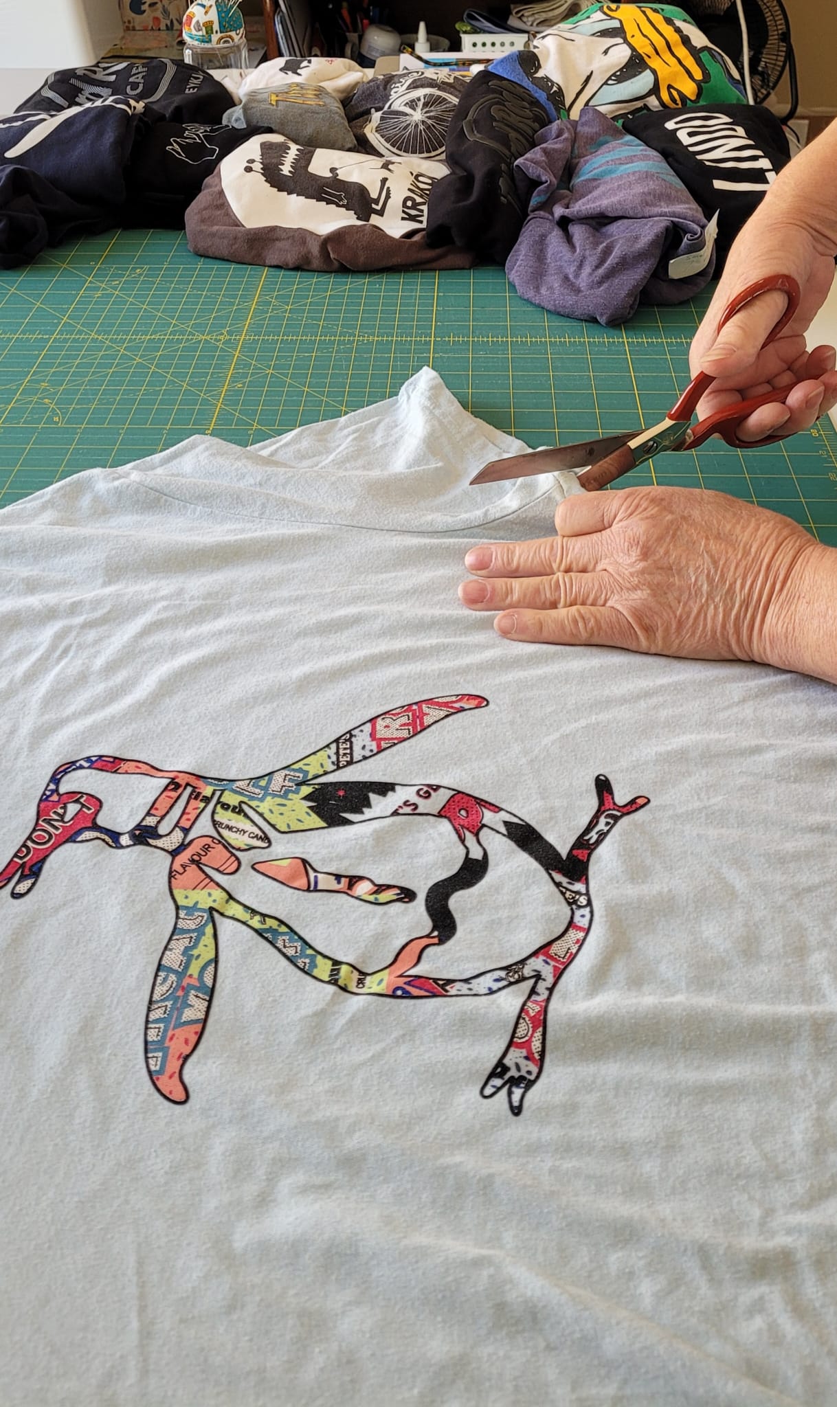 Cutting a tshirt for a memory quilt