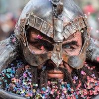 warrior with glitter and confetti in and on his helmet