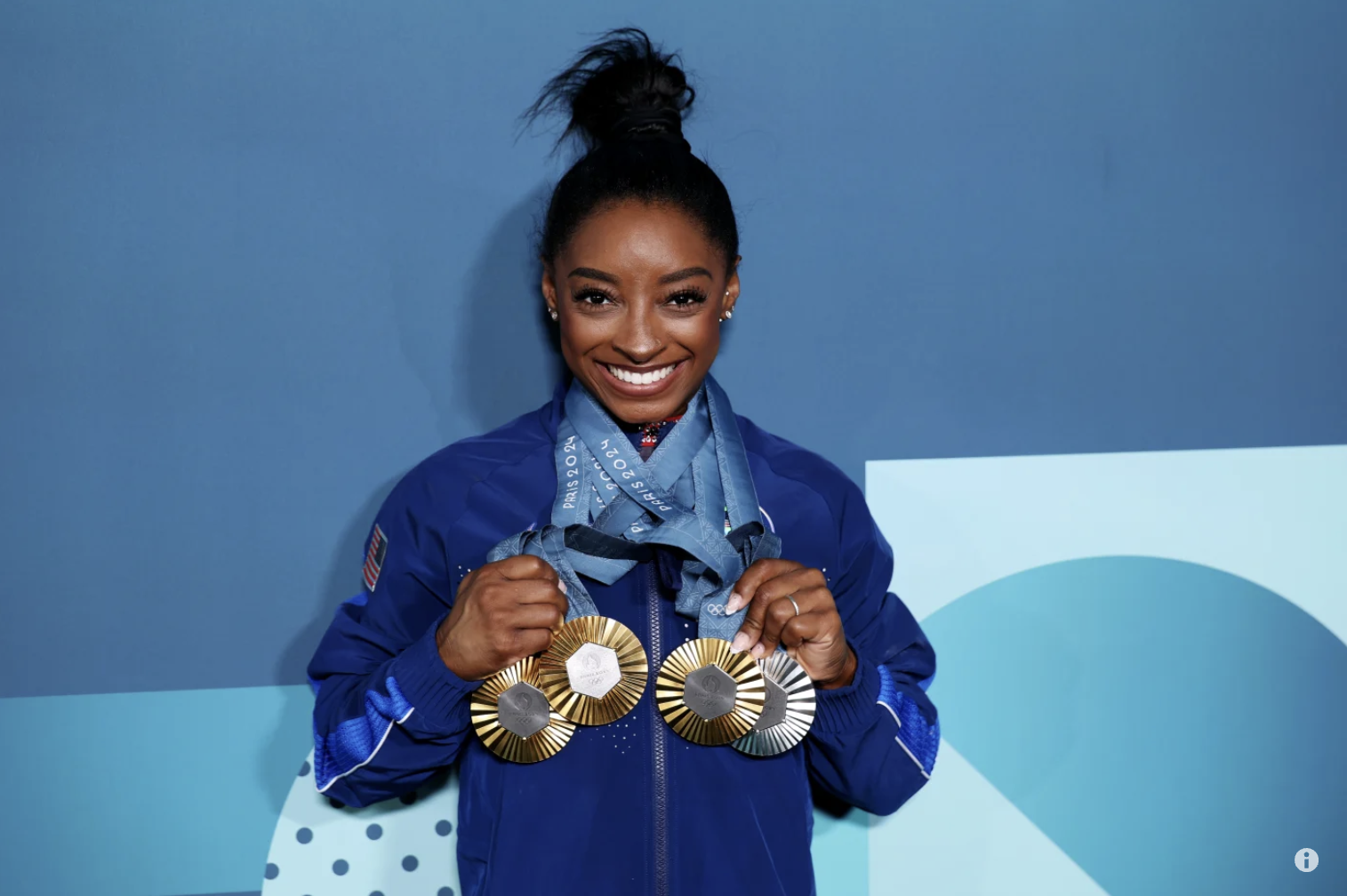 Simone Biles poses with her Paris 2024 Olympic medals Simone Biles poses with her Paris 2024 Olympic medals