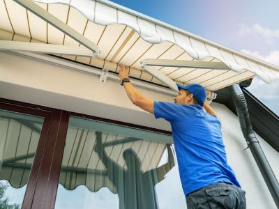 Awning installed on home to save energy