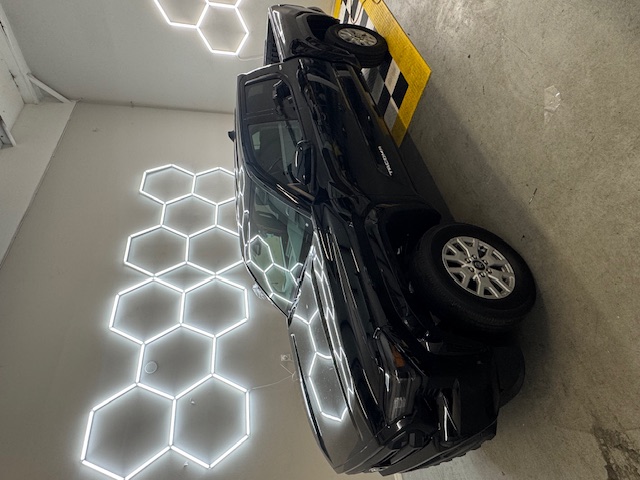 Flawless tint finish on a car rear window at Tintxpress