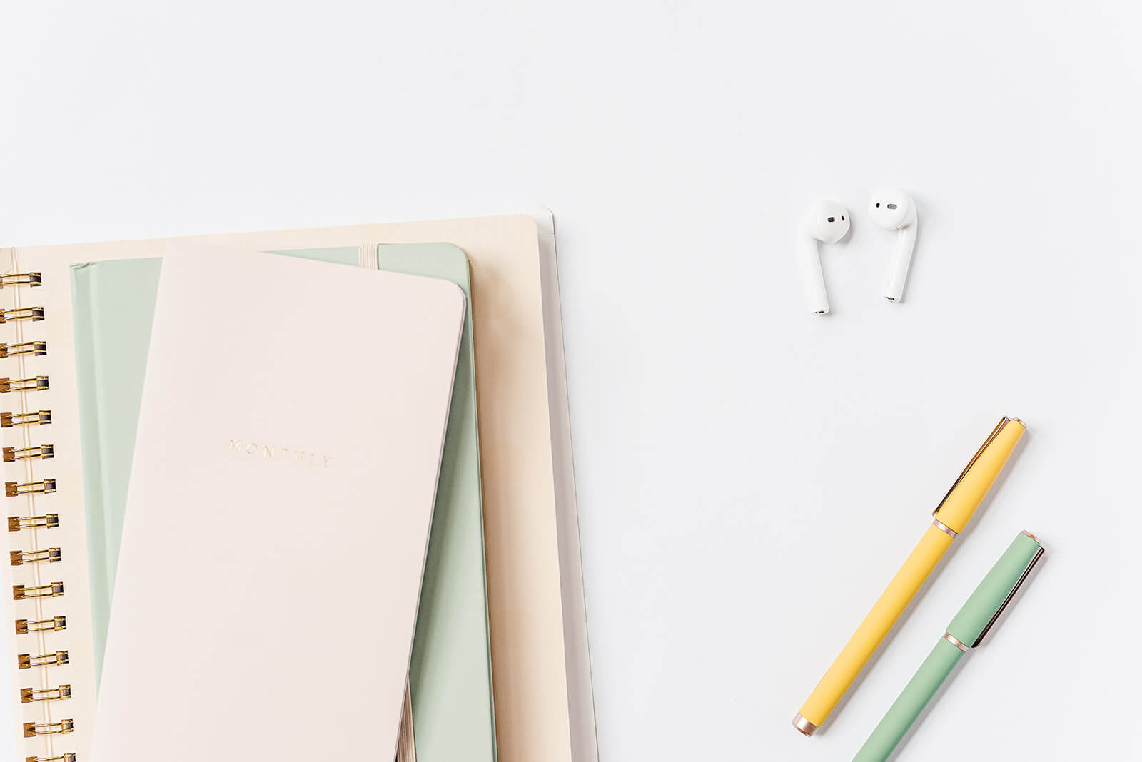 Notebooks symbolizing organized planning for mompreneurs Notebooks symbolizing organized planning for mompreneurs