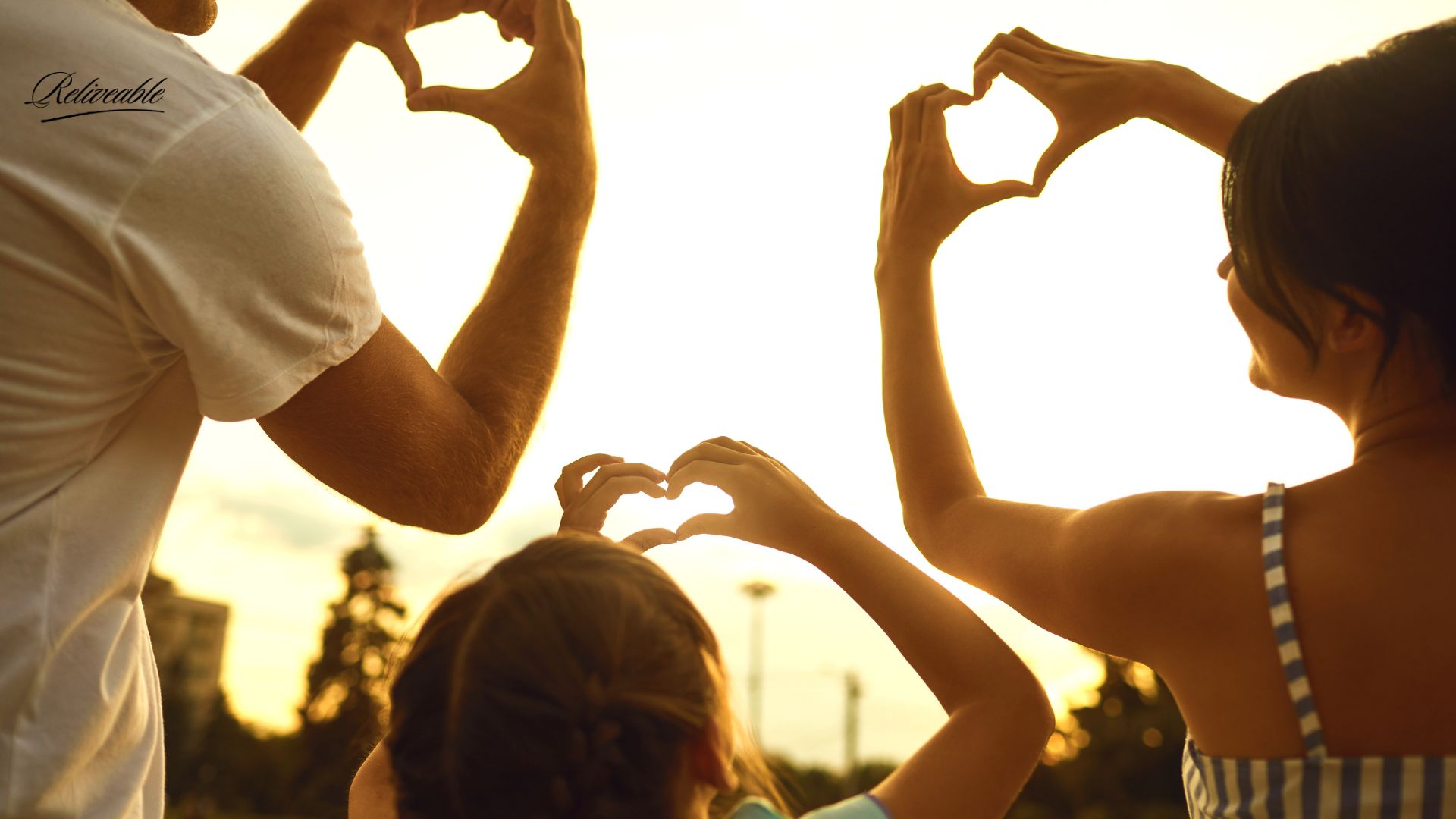 A family gathered around a ReLiveable interactive voice memorial, finding comfort in their loved one’s voice.