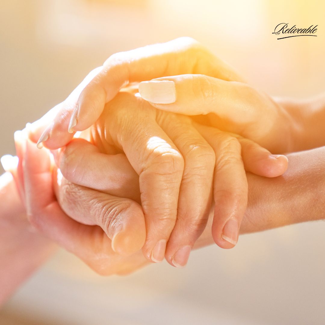 A family finding comfort in a ReLiveable voice memorial, celebrating their loved one’s legacy.