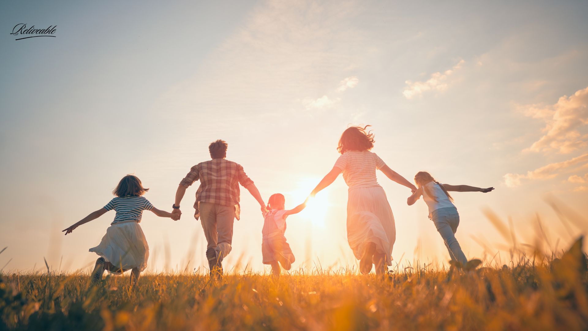 A family finding comfort in a ReLiveable hospice voice memorial, bridging sci-fi dreams with real connection.