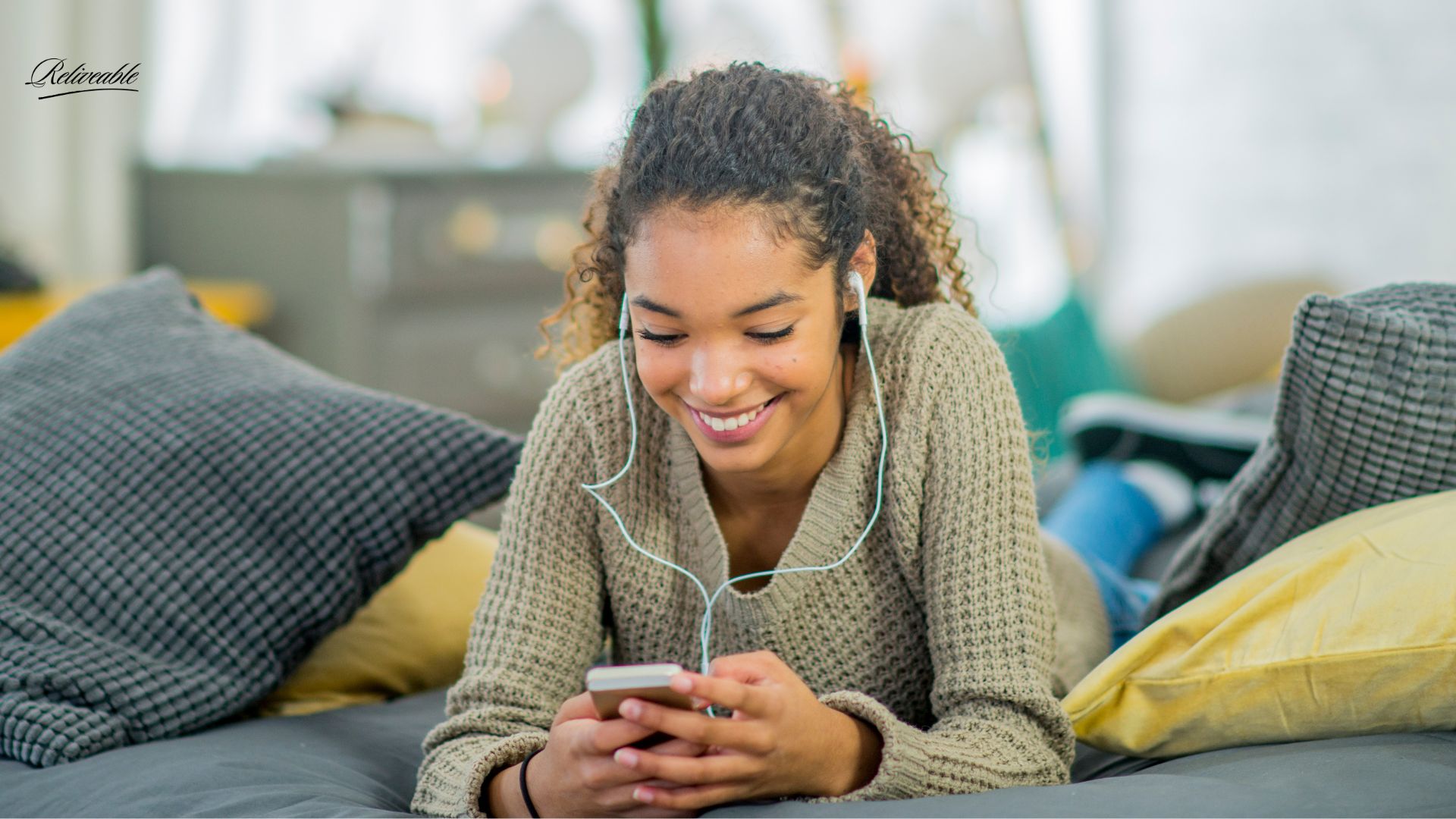 A teenager listens to a Legacy Voice Message from ReLiveable’s AI Memorial Services, preserving family stories.