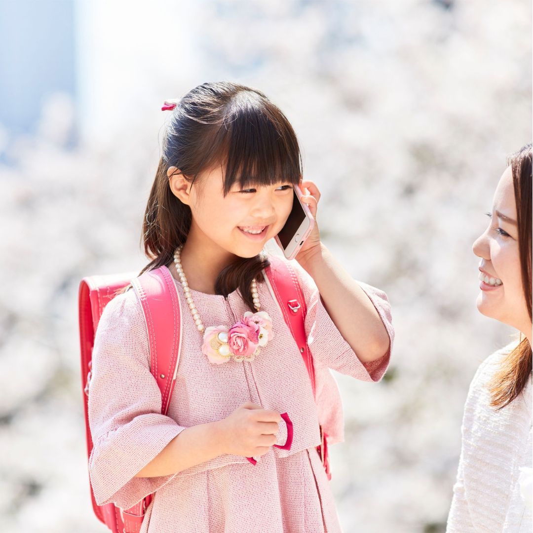A child listens to an Interactive Voice Memorial from ReLiveable’s interactive voice keepsakes, preserving family stories.