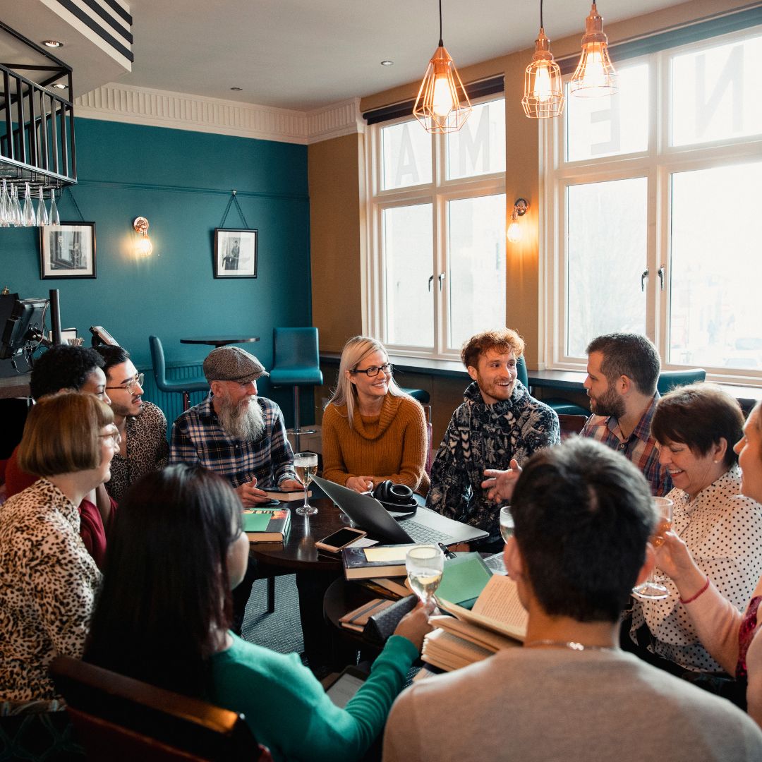 A book club shares an Interactive Voice Memorial from ReLiveable’s AI conversational grief support during a community event.