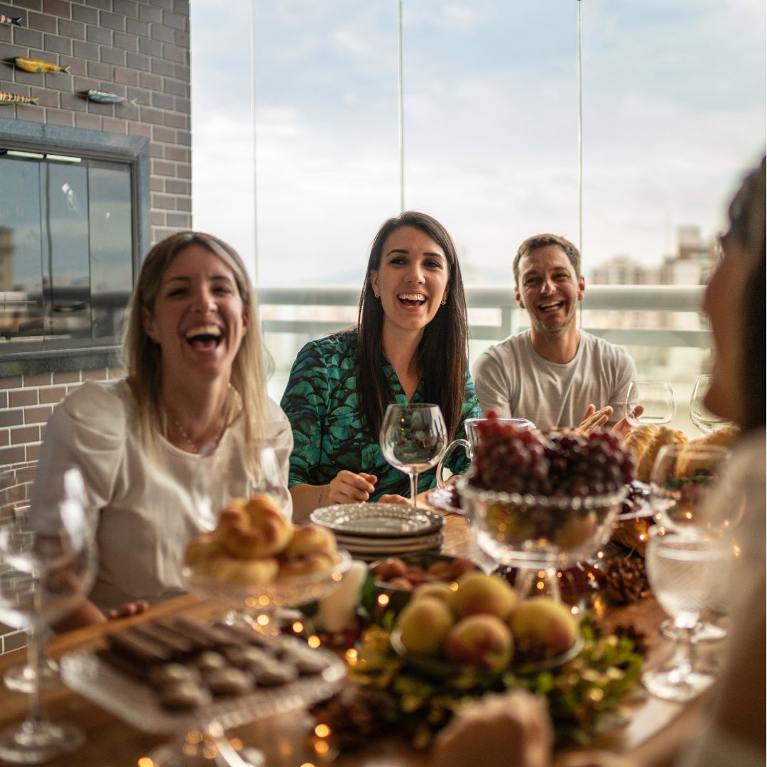 A community interacts with a shared Interactive Voice Memorial from ReLiveable’s AI Memorial Services at a gathering.