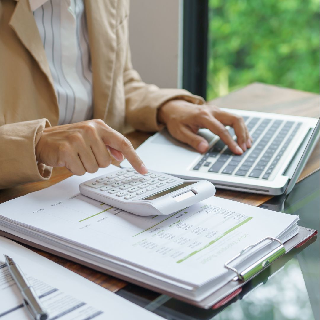 A funeral director reviews a cost-saving dashboard for ReLiveable’s AI memorials for funeral homes.