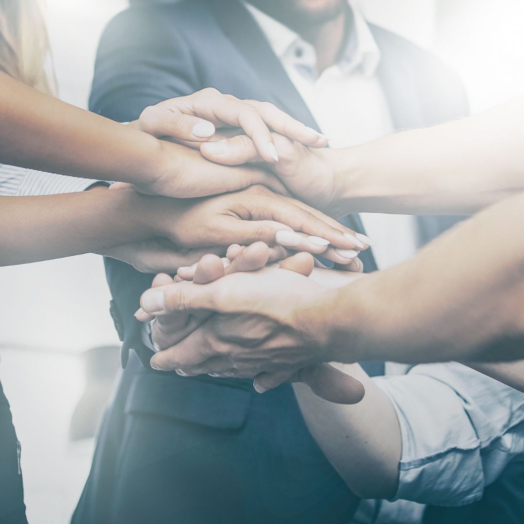 A community interacts with a shared AI memorial hub from ReLiveable’s AI Memorial Services in a virtual town square.