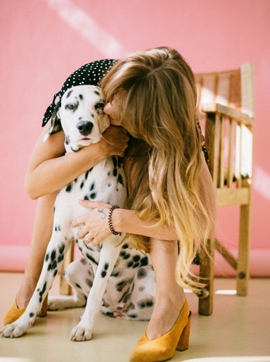 woman hugging her dog
