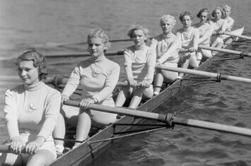 group of women rowing a boat