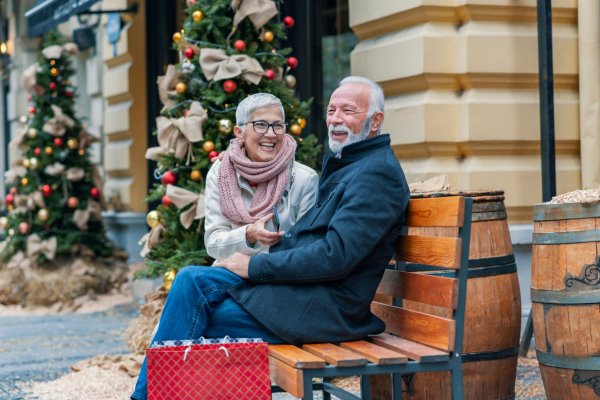 Senior Couple Relaxing After Holiday Shopping Senior Couple Relaxing After Holiday Shopping