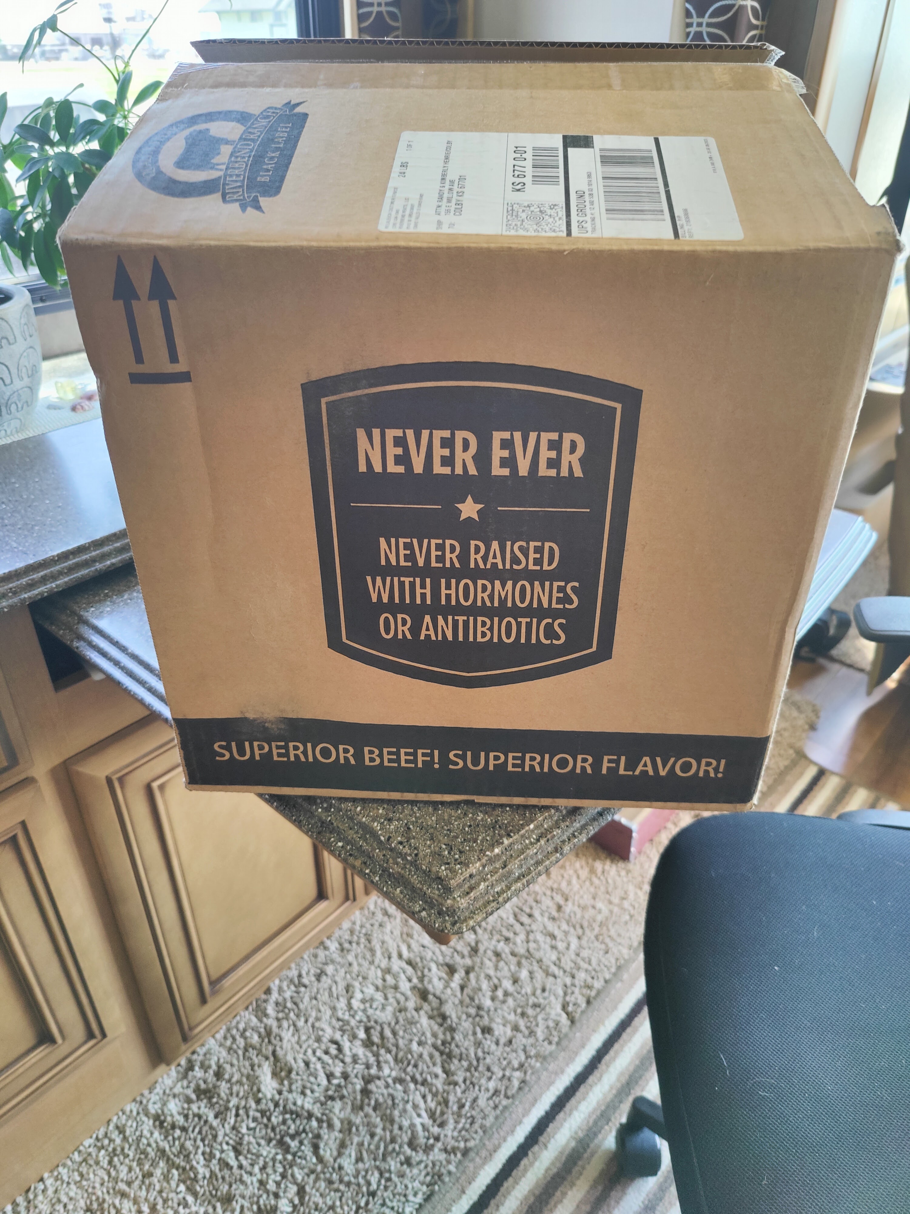 Shipping box with Riverbend Ranch Logo