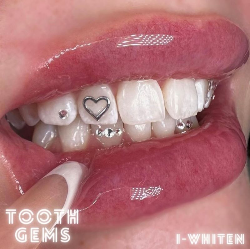Silver heart tooth gem