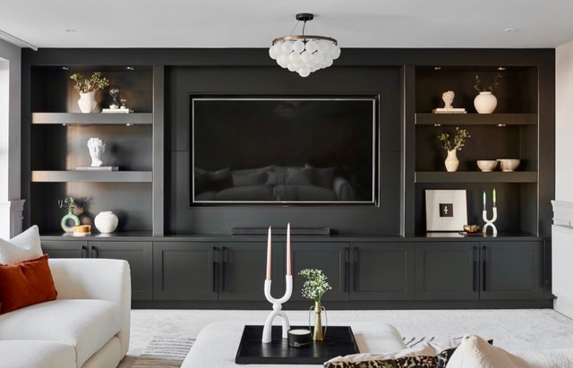 Bespoke media wall with storage, sprayed in matt black Bespoke media wall with storage, sprayed in matt black
