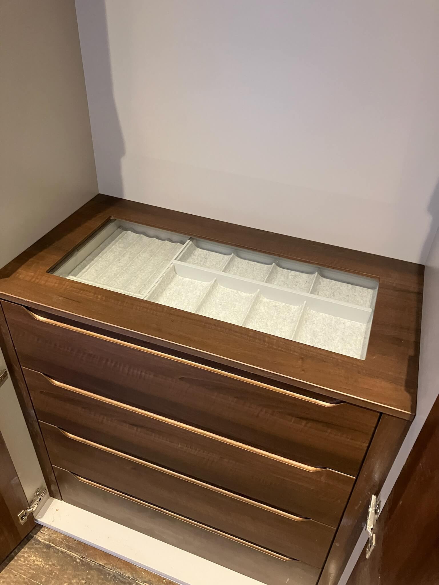 Luxury fitted wardrobe in Leeds with drawer unit in walnut finish with velvet lined jewelry organiser compartments Luxury fitted wardrobe in Leeds with drawer unit in walnut finish with velvet lined jewelry organiser compartments
