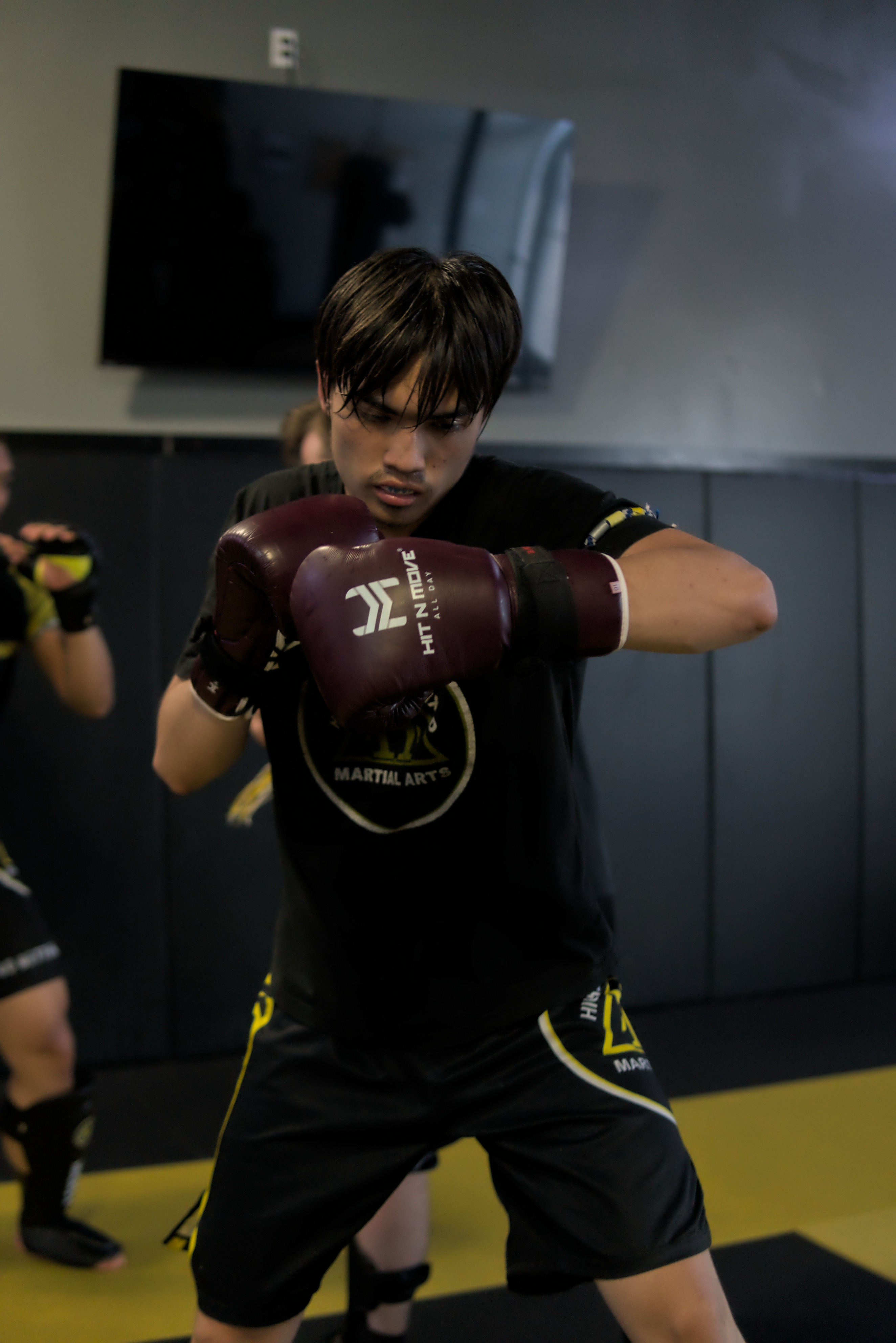 Student practicing a boxing hook technique at Hicks MMA, demonstrating focus and continuous improvement in martial arts training. Student practicing a boxing hook technique at Hicks MMA, demonstrating focus and continuous improvement in martial arts training.
