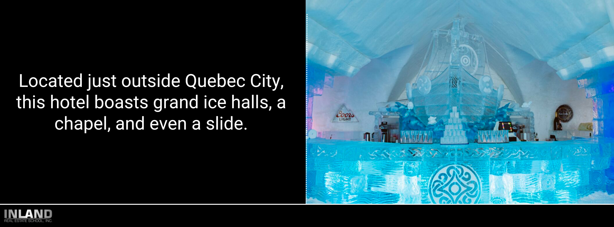 Ice bar surrounded by ornate snow carvings.